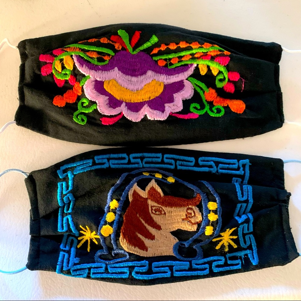 Two embroidered face masks